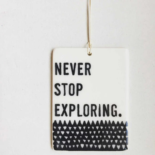 Porcelain Wall Tag - Never Stop Exploring